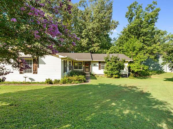 3.67 Acres of Land with Home for Sale in Clifton, Tennessee