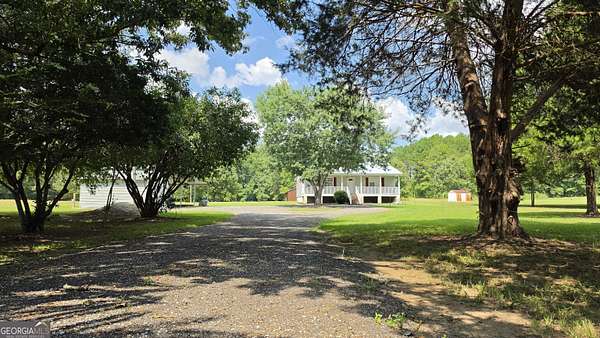 5 Acres of Land with Home for Sale in Gay, Georgia