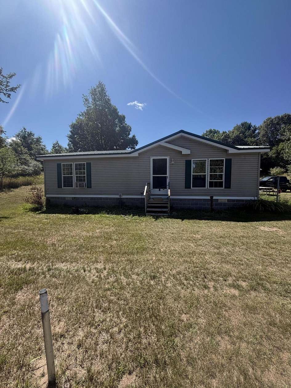 5 Acres of Land with Home for Sale in Shelby, Michigan