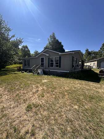 5 Acres of Land with Home for Sale in Shelby, Michigan