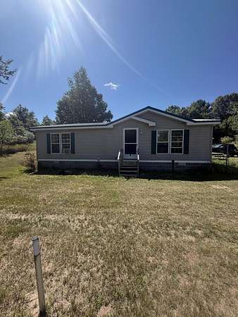 5 Acres of Land with Home for Sale in Shelby, Michigan