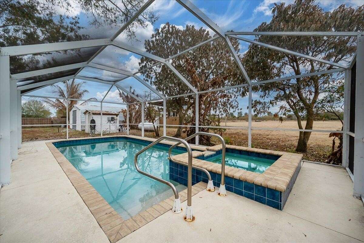 5 Acres of Land with Home for Sale in Moore Haven, Florida