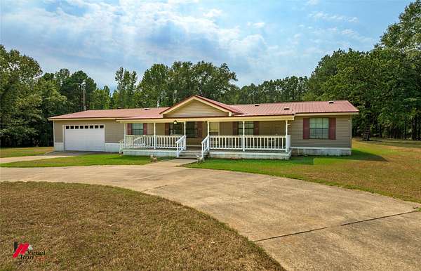 9.1 Acres of Land with Home for Sale in Shongaloo, Louisiana