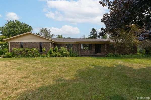 11.4 Acres of Land with Home for Sale in Dryden Township, Michigan