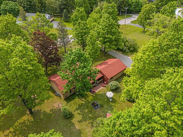 10 Acres of Land with Home for Sale in Onekama, Michigan