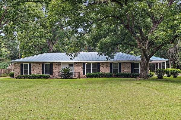 2.26 Acres of Land with Home for Sale in Grand Bay, Alabama