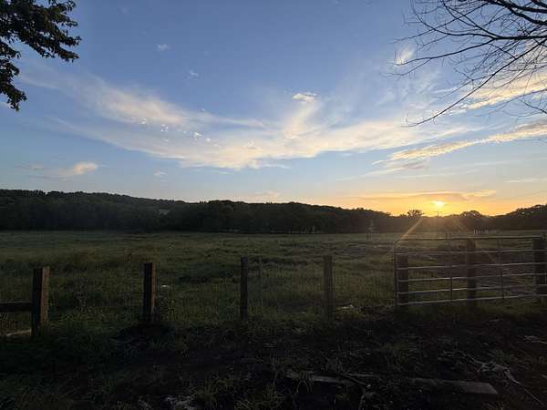 27 Acres of Land with Home for Sale in Macomb, Missouri