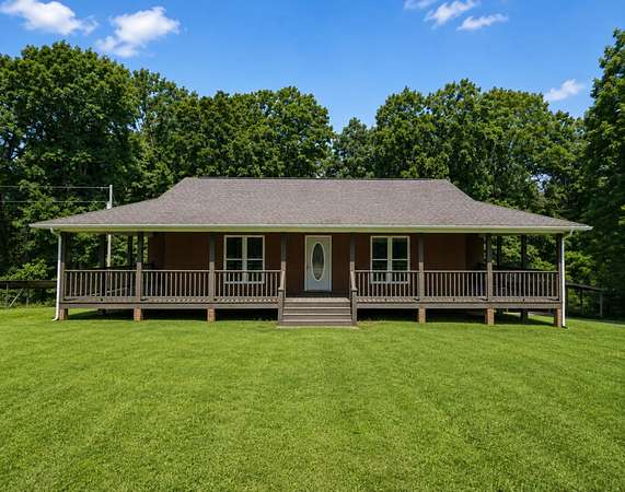 7.8 Acres of Land with Home for Sale in Erin, Tennessee