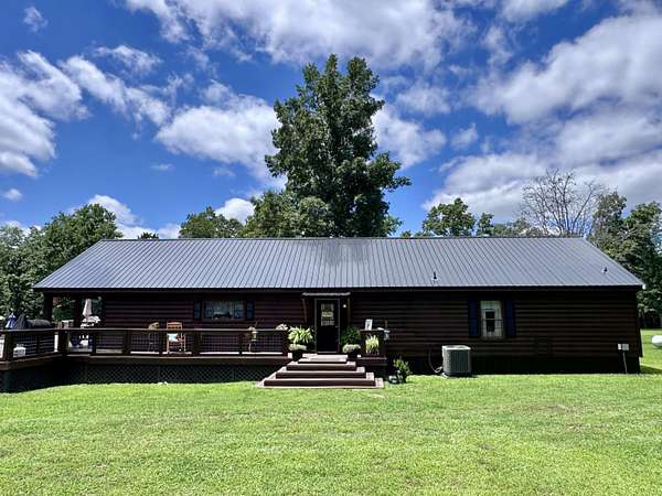 130 Acres of Recreational Land with Home for Sale in Koshkonong, Missouri