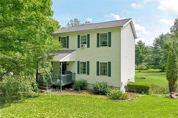 7 Acres of Land with Home for Sale in Newfield, New York