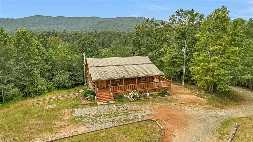 13.8 Acres of Land with Home for Sale in Ferguson, North Carolina