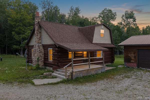 40 Acres of Recreational Land with Home for Sale in Cornell, Michigan