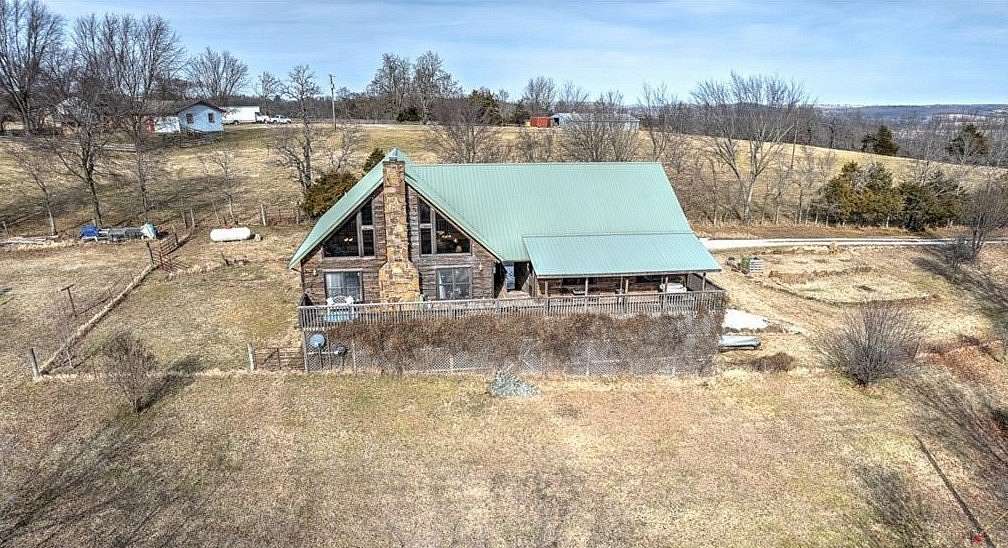 1.83 Acres of Land with Home for Sale in Elkins, Arkansas