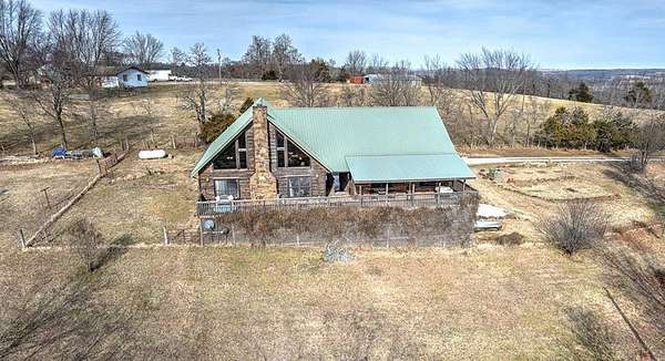 1.83 Acres of Land with Home for Sale in Elkins, Arkansas