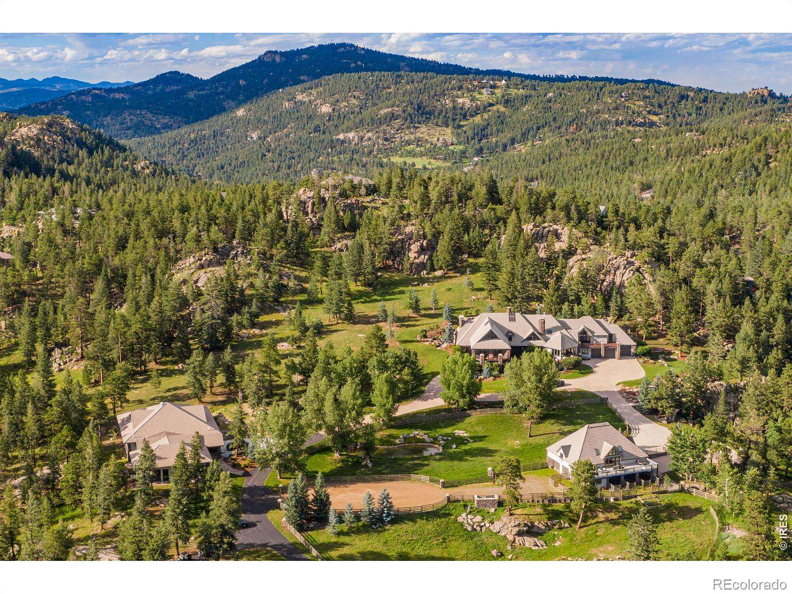 30 Acres of Land with Home for Auction in Evergreen, Colorado