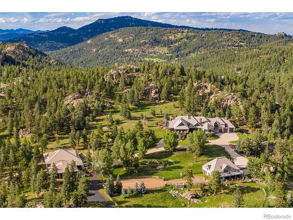 30 Acres of Land with Home for Auction in Evergreen, Colorado