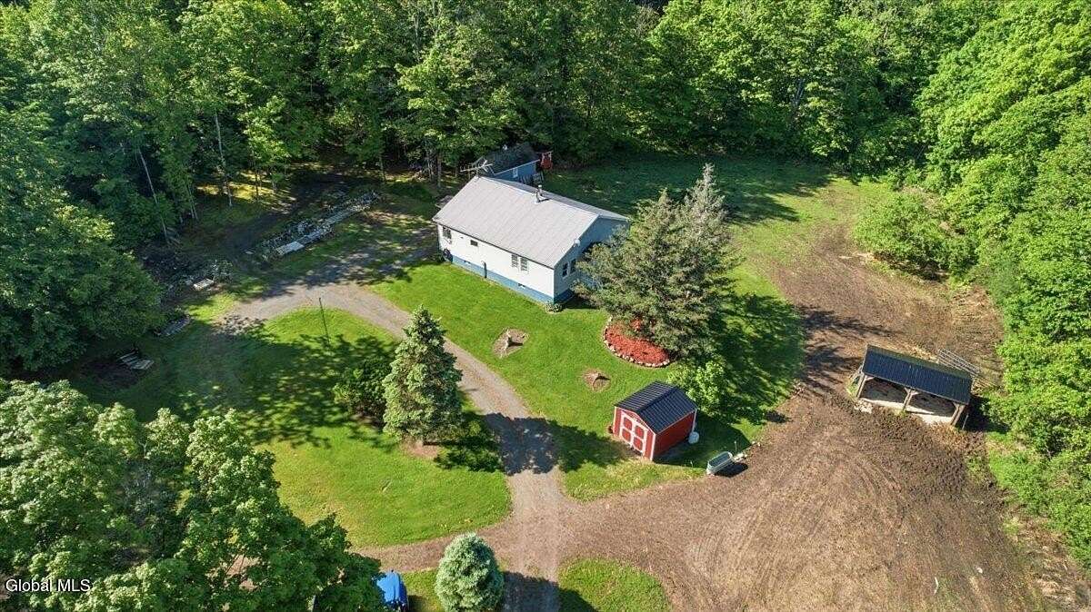 29.5 Acres of Land with Home for Sale in Comstock, New York