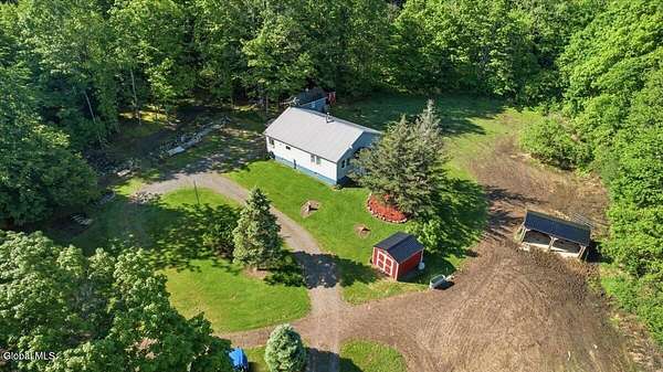29.5 Acres of Land with Home for Sale in Comstock, New York