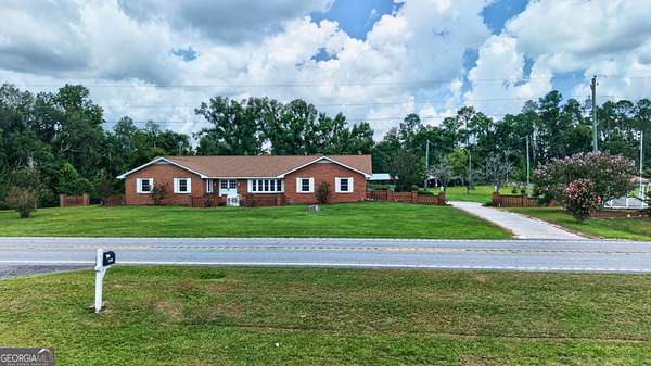 10.8 Acres of Land with Home for Sale in Soperton, Georgia