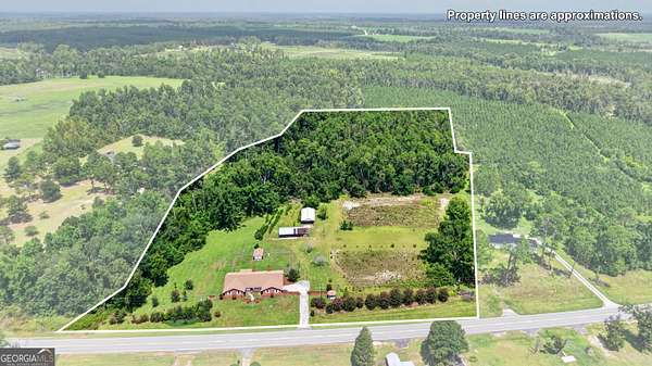 10.8 Acres of Land with Home for Sale in Soperton, Georgia