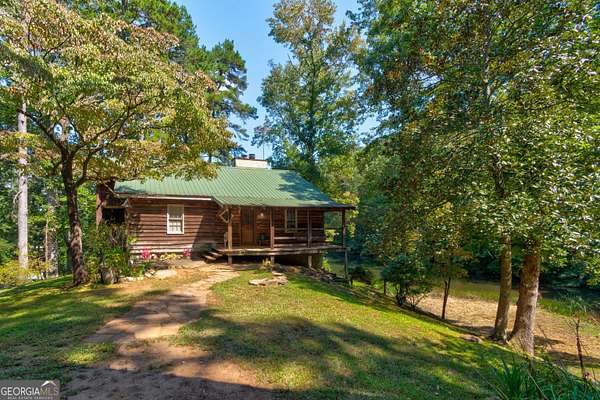 9.88 Acres of Land with Home for Sale in Dawsonville, Georgia
