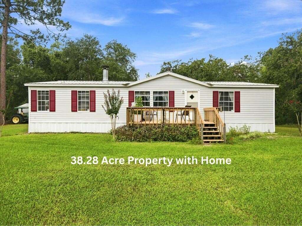 38.3 Acres of Recreational Land with Home for Sale in Branford, Florida