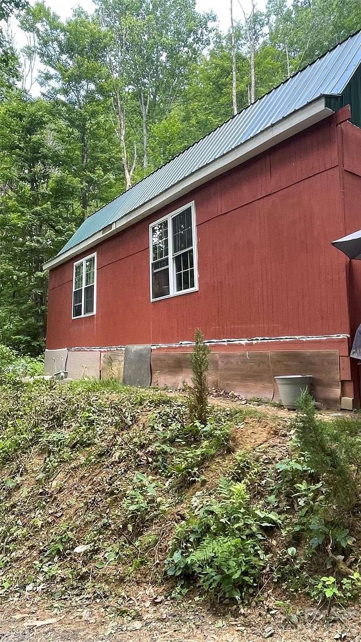 5.15 Acres of Land with Home for Sale in Creston, North Carolina