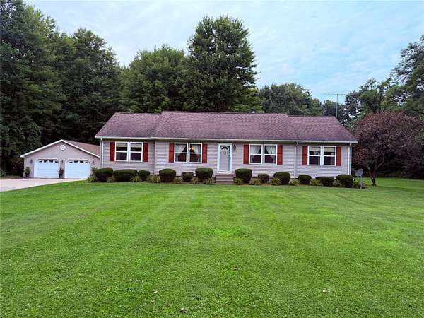 1.69 Acres of Land with Home for Sale in Girard, Pennsylvania