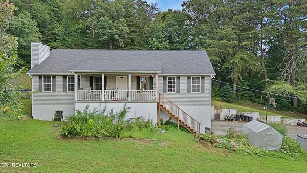 6.8 Acres of Land with Home for Sale in Knoxville, Tennessee