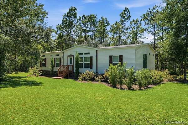 4.89 Acres of Land with Home for Sale in Lecanto, Florida