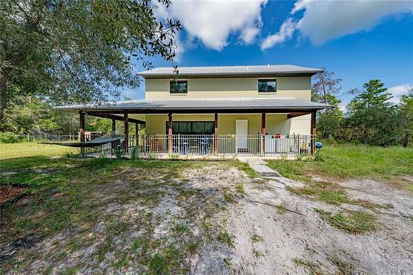 9.1 Acres of Land with Home for Sale in Eustis, Florida