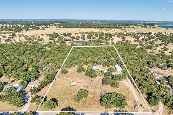 6.83 Acres of Land with Home for Sale in Mineral Wells, Texas