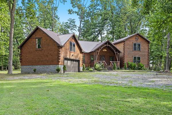 3.14 Acres of Land with Home for Auction in Cottontown, Tennessee