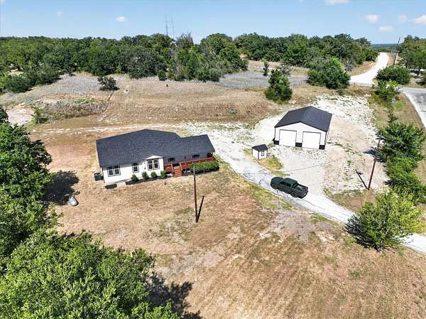 11.6 Acres of Land with Home for Sale in Springtown, Texas