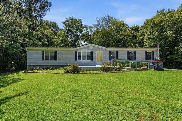 2.7 Acres of Land with Home for Sale in Walling, Tennessee