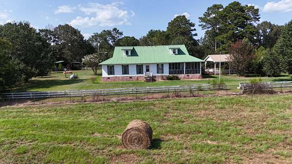 107 Acres of Land with Home for Sale in Centre, Alabama