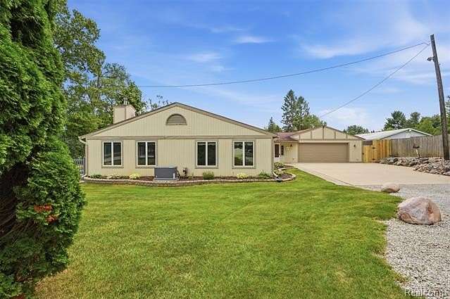 5 Acres of Land with Home for Sale in Salem Township, Michigan