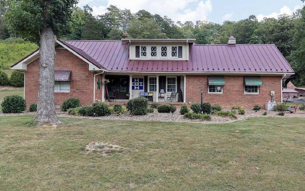 140 Acres of Land with Home for Sale in Van Lear, Kentucky