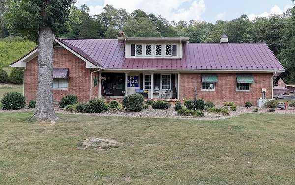140 Acres of Land with Home for Sale in Van Lear, Kentucky