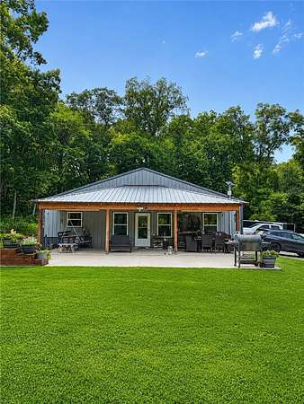 204 Acres of Land with Home for Sale in Goodman, Missouri