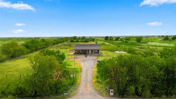 2.43 Acres of Land with Home for Lease in Celina, Texas
