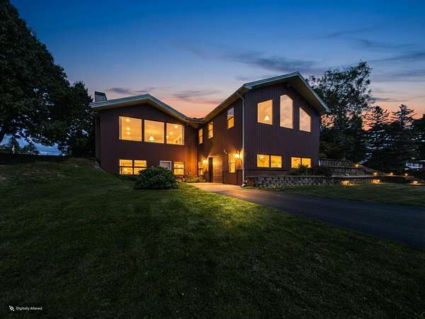 1.64 Acres of Land with Home for Sale in Caribou, Maine