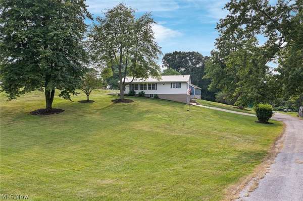 3.6 Acres of Land with Home for Sale in Canal Fulton, Ohio