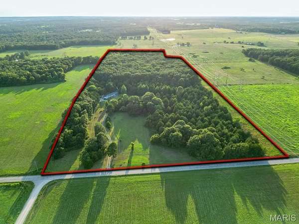 25 Acres of Land with Home for Sale in Lebanon, Missouri