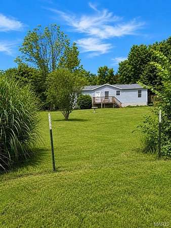 5.19 Acres of Land with Home for Sale in Festus, Missouri
