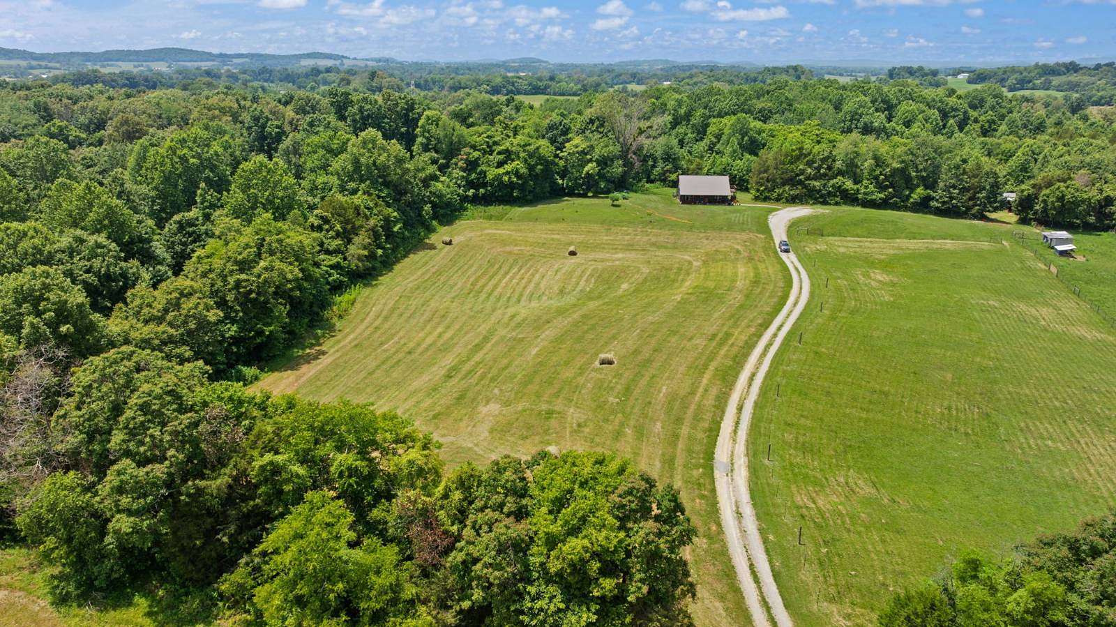 35.3 Acres of Agricultural Land with Home for Sale in Canmer, Kentucky