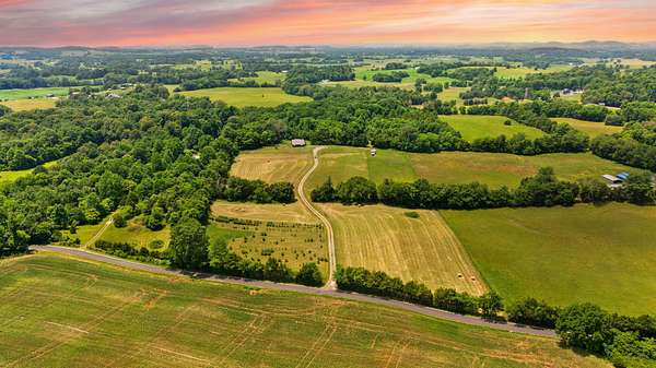 35.3 Acres of Land with Home for Sale in Canmer, Kentucky