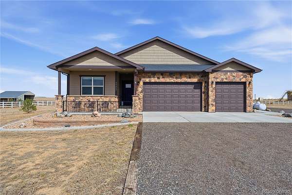 2 Acres of Land with Home for Sale in Keenesburg, Colorado