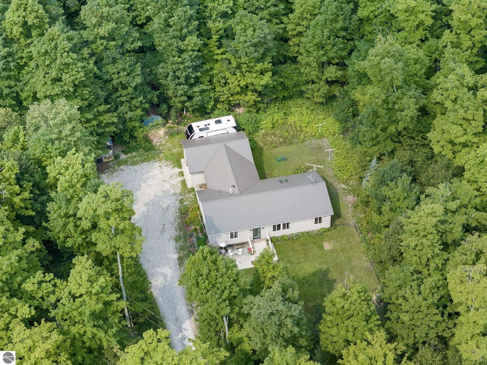 3.25 Acres of Land with Home for Sale in Cedar, Michigan