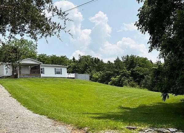 5 Acres of Land with Home for Sale in Sadieville, Kentucky
